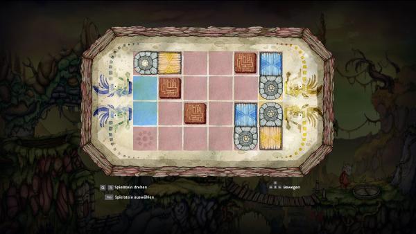 Screenshot: In einem Minispiel müssen verschiedene Steine an die richtige Position verschoben werden.