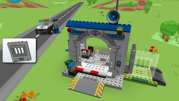 Screenshot: Polizeistation mit Einsatzwagen und Lego-Polizist.