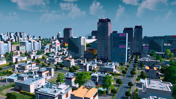 Am Bild ist eine Ansicht der Stadt mit Hochhäusern im Hintergrund.