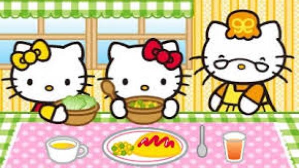 Hello-Kitty Familie sitzt am Tisch und isst